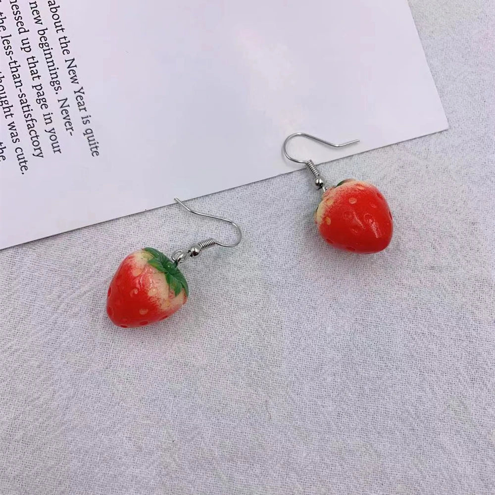 The elegant and minimalist design of the acrylic strawberry pendant earrings adds a touch of simplicity to any outfit. Crafted with high-quality materials, these drop earrings are a thoughtful gift for girls and women who appreciate lovely jewelry.