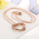 Exquisite Heart shape, ravishing Pendant Necklaces crafted from Copper and bejeweled with Cubic Zirconia - designed to make any look sophisticated. Women's Fashion Necklaces, with a Link Chain finish, perfect for any occasion.