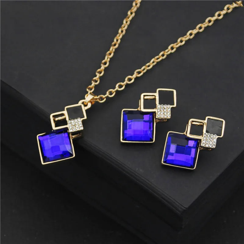 Explore our exquisite collection of crystal pendant necklaces and earrings sets designed for women. This jewelry set is perfect for bridal wear or as a statement piece for a wedding choker necklace set.