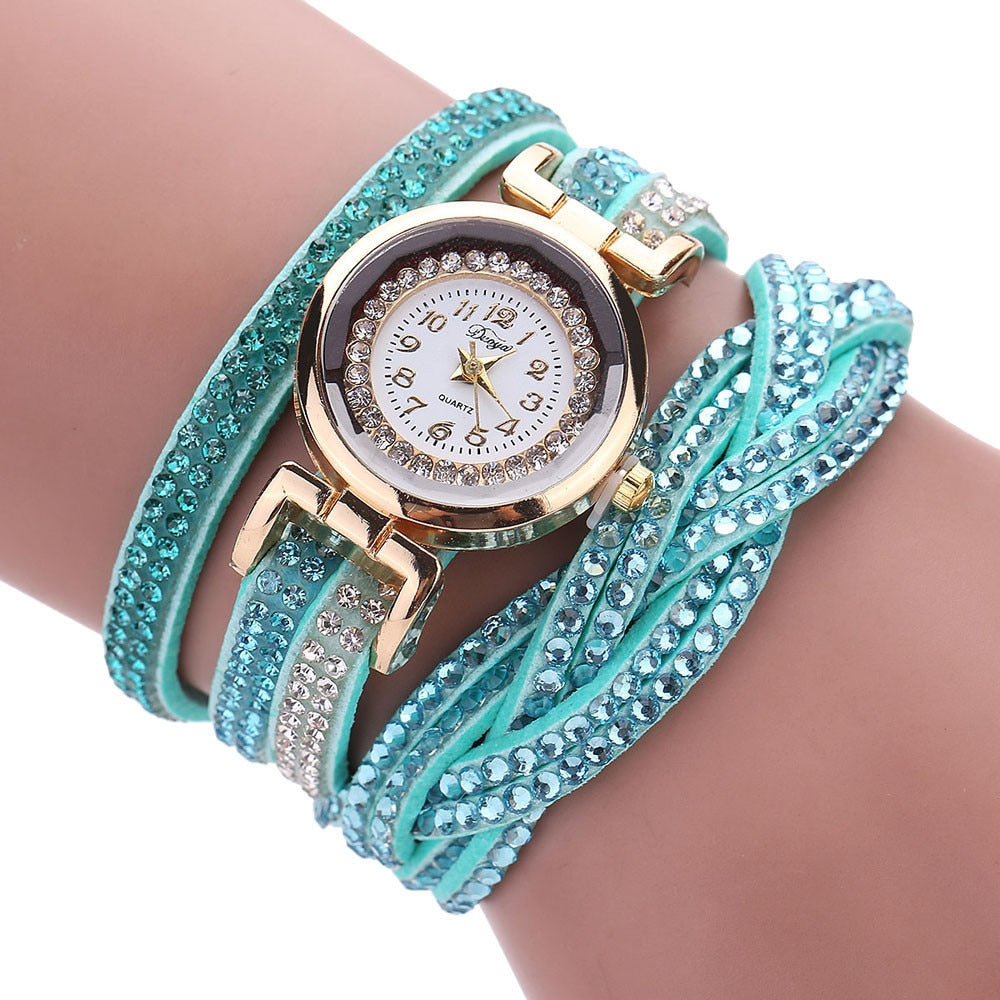 Stay polished and professional with whatever the occasion calls for. This Luxury Crystal Woman Gold Bracelet Quartz Watch features a chic design perfect for any ensemble.