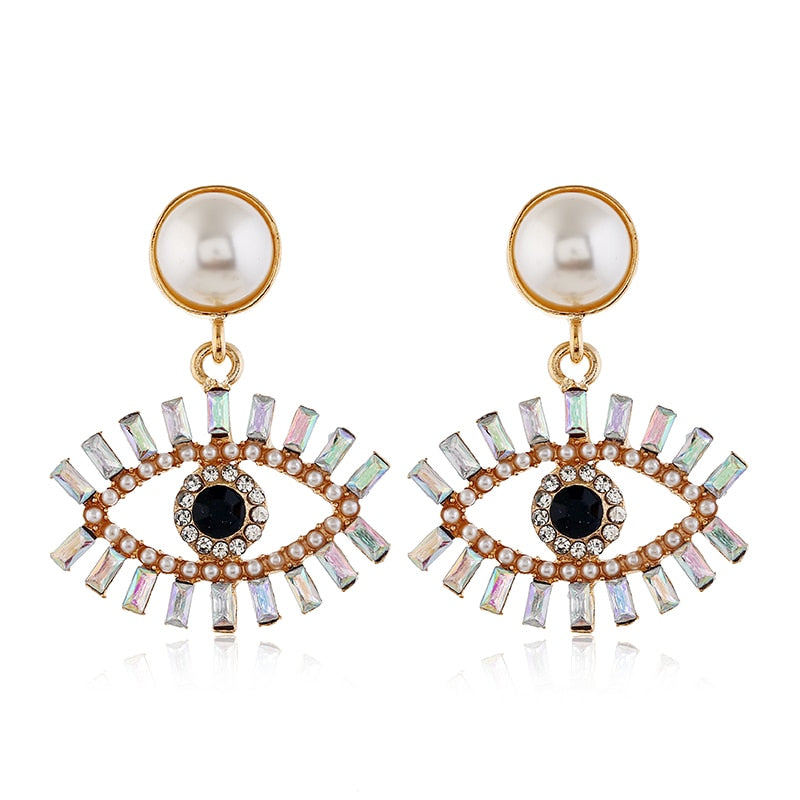 Fashion-forward and flashy, these Geometric Rhinestone Evil Eye Statement Earrings offer beauty and style. Perfect for any look, these stunning earrings are crafted for women, making sure you dazzle wherever you go!