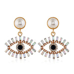 Fashion-forward and flashy, these Geometric Rhinestone Evil Eye Statement Earrings offer beauty and style. Perfect for any look, these stunning earrings are crafted for women, making sure you dazzle wherever you go!