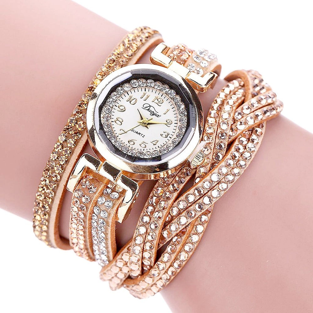 Stay polished and professional with whatever the occasion calls for. This Luxury Crystal Woman Gold Bracelet Quartz Watch features a chic design perfect for any ensemble.