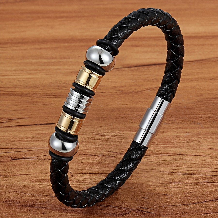 Experience masculine elegance with this Genuine Leather/Stainless Steel Bracelet! Designed with a Classic Shape and Geometric Pattern, this timeless men's bracelet radiates classic style. Let this refined, braided black bracelet elevate your style!