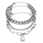 Experience high-quality beauty with our Punk Heavy Metal Crystal Lock Pendant Bracelet Set! Crafted with durable metal and zinc alloy, this eye-catching bracelet is sure to draw attention. It's perfect for the modern woman who loves unique fashion. Enjoy the link chain and special lock pendant for a look that's both timeless and cutting-edge.