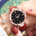 Rhinestone Romantic Starry Sky Women's Luxury Watch - A celestial-themed watch with twinkling rhinestones on the dial, Tungsten Steel case, and a luxurious leather band.