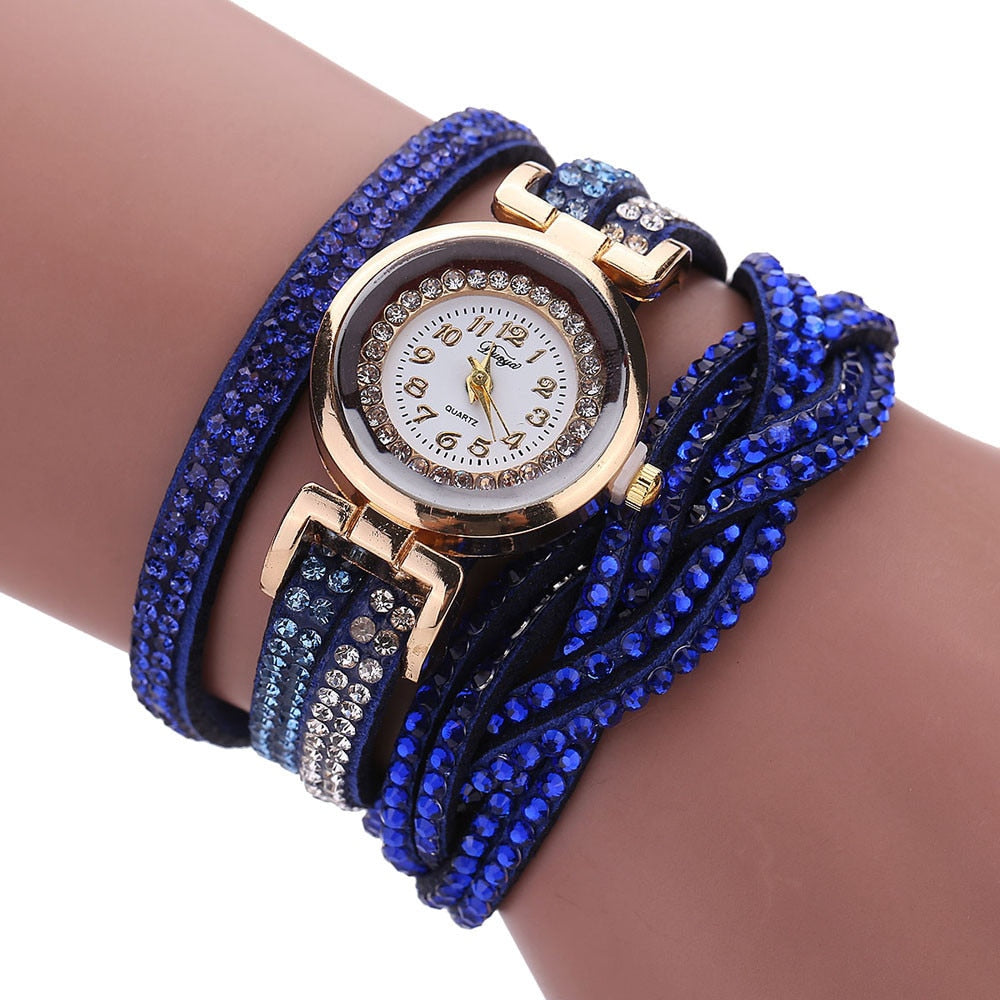 Stay polished and professional with whatever the occasion calls for. This Luxury Crystal Woman Gold Bracelet Quartz Watch features a chic design perfect for any ensemble.