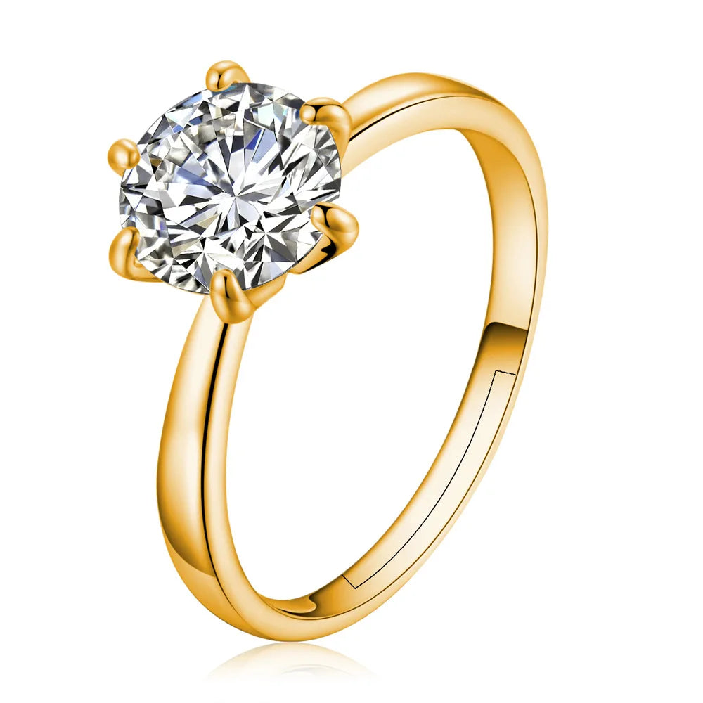This elegant ring features a classic six-claw design in a gold color, adorned with AAA Austria crystals, making it a perfect choice for a wedding or engagement ring for women. It also makes a great Christmas gift for the bride.