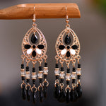 These Bohema Ethnic Fringed Tassel Earrings boast a stylish geometric shape and are crafted with a glossy acrylic water drop. Women of all ages will love wearing these beautiful metal earrings.