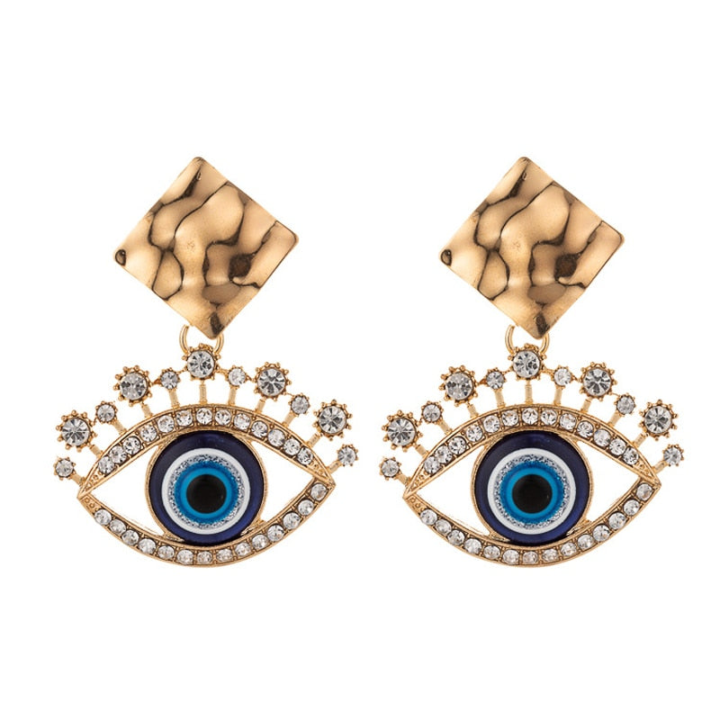 Fashion-forward and flashy, these Geometric Rhinestone Evil Eye Statement Earrings offer beauty and style. Perfect for any look, these stunning earrings are crafted for women, making sure you dazzle wherever you go!