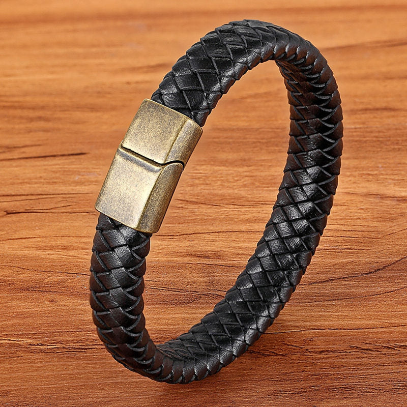 Experience masculine elegance with this Genuine Leather/Stainless Steel Bracelet! Designed with a Classic Shape and Geometric Pattern, this timeless men's bracelet radiates classic style. Let this refined, braided black bracelet elevate your style!