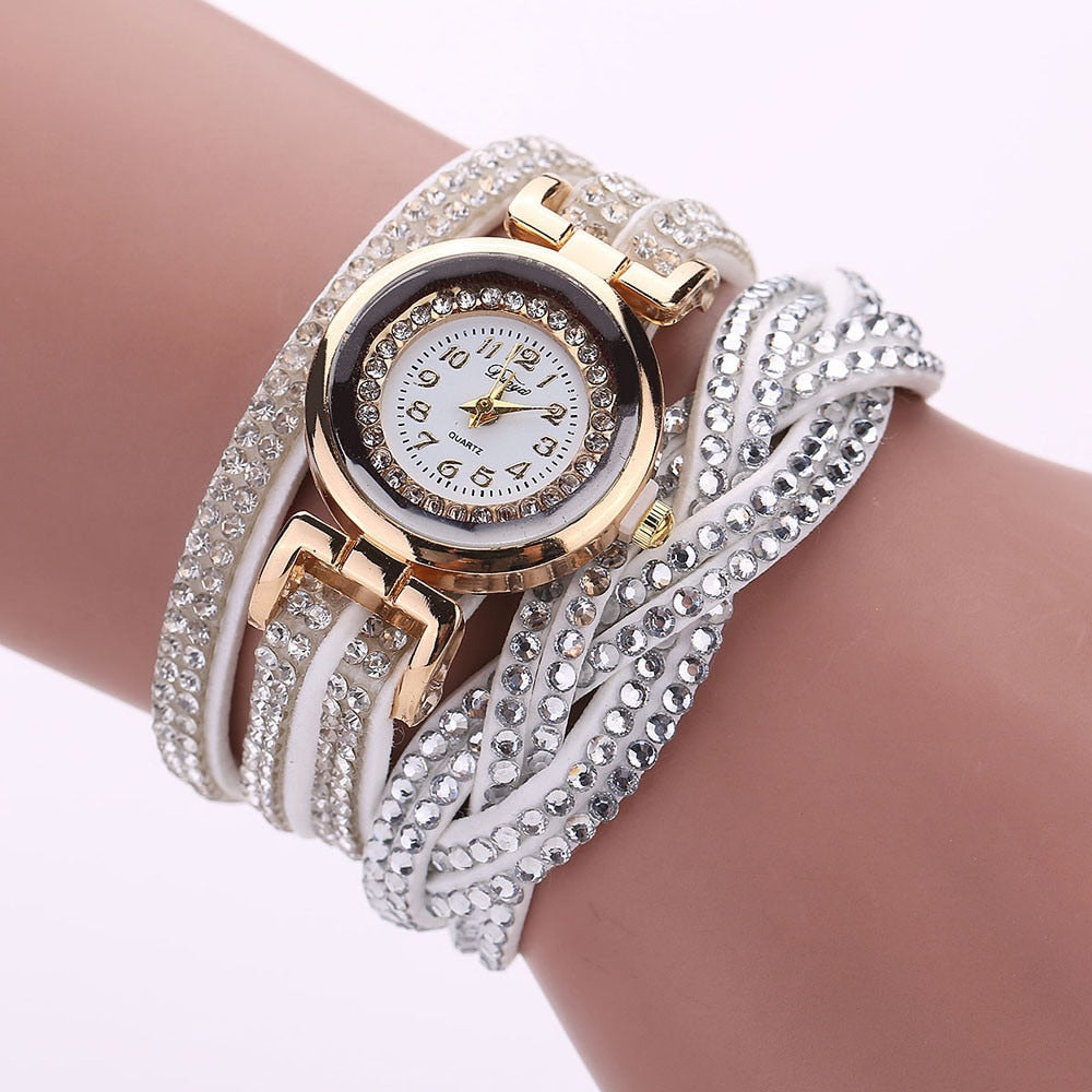 Stay polished and professional with whatever the occasion calls for. This Luxury Crystal Woman Gold Bracelet Quartz Watch features a chic design perfect for any ensemble.