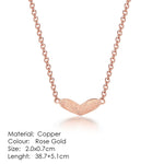 Exquisite Heart shape, ravishing Pendant Necklaces crafted from Copper and bejeweled with Cubic Zirconia - designed to make any look sophisticated. Women's Fashion Necklaces, with a Link Chain finish, perfect for any occasion.