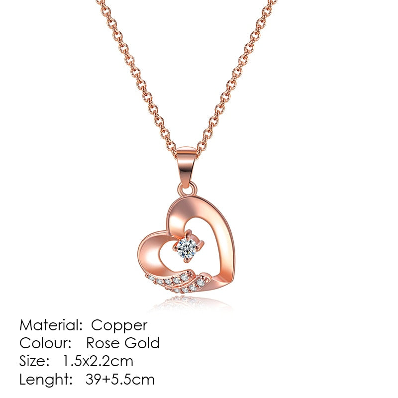 Exquisite Heart shape, ravishing Pendant Necklaces crafted from Copper and bejeweled with Cubic Zirconia - designed to make any look sophisticated. Women's Fashion Necklaces, with a Link Chain finish, perfect for any occasion.