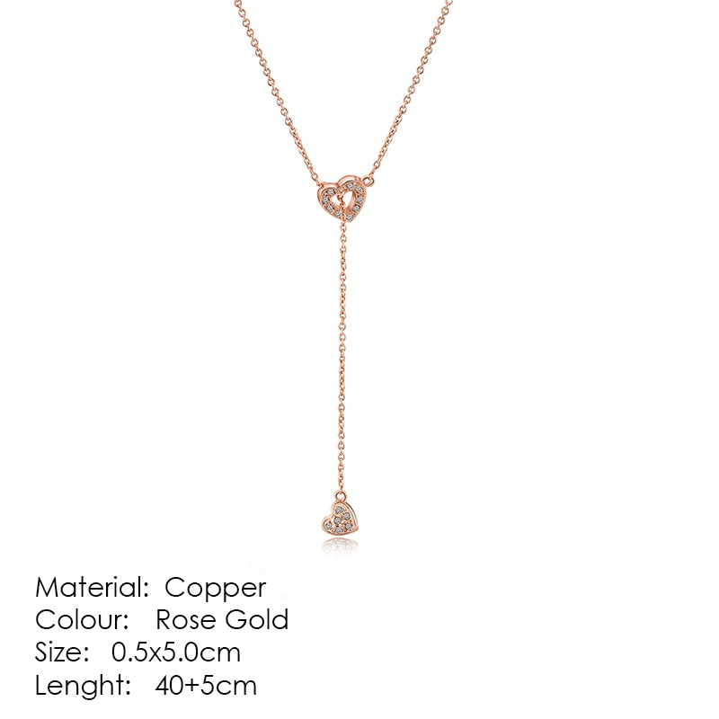 Exquisite Heart shape, ravishing Pendant Necklaces crafted from Copper and bejeweled with Cubic Zirconia - designed to make any look sophisticated. Women's Fashion Necklaces, with a Link Chain finish, perfect for any occasion.