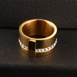 Elevate your style with our exquisite collection of wide rings for women. Crafted from high-quality stainless steel, these silver-colored rings feature a single row of sparkling cubic zirconia, adding a touch of luxury to any outfit. Perfect for wedding bands or everyday wear, these rings are designed to make a statement and enhance your femininity. Explore our range and find the perfect ring for you.