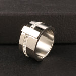 Elevate your style with our exquisite collection of wide rings for women. Crafted from high-quality stainless steel, these silver-colored rings feature a single row of sparkling cubic zirconia, adding a touch of luxury to any outfit. Perfect for wedding bands or everyday wear, these rings are designed to make a statement and enhance your femininity. Explore our range and find the perfect ring for you.