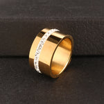 Elevate your style with our exquisite collection of wide rings for women. Crafted from high-quality stainless steel, these silver-colored rings feature a single row of sparkling cubic zirconia, adding a touch of luxury to any outfit. Perfect for wedding bands or everyday wear, these rings are designed to make a statement and enhance your femininity. Explore our range and find the perfect ring for you.