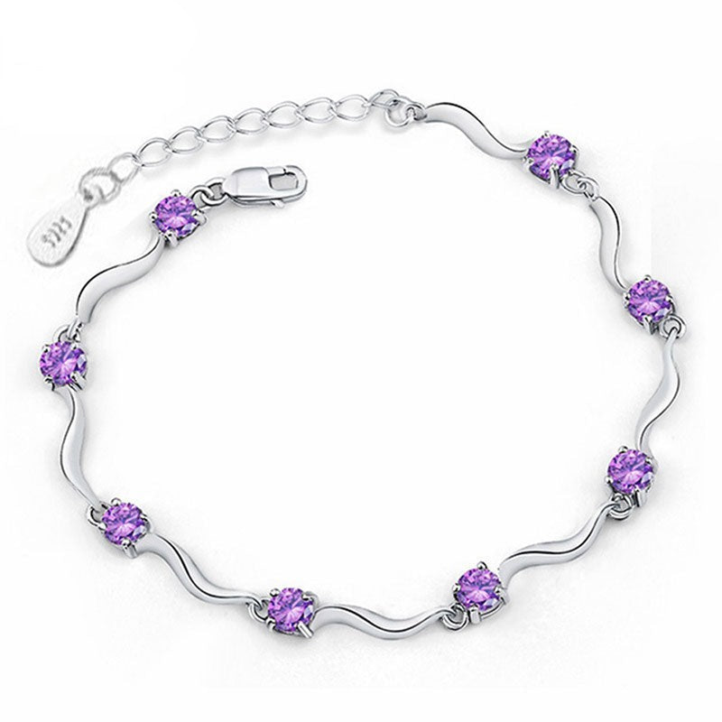 This stunning Purple Cubic Zircon Crystal Bracelet is a must have accessory! Featuring an exquisite geometric shape and an easy-hook clasp, the stunning snake chain is sure to make an unforgettable statement. An absolute essential for any savvy fashionista, this gorgeous bracelet is made of Cubic Zirconia, perfect for Women!