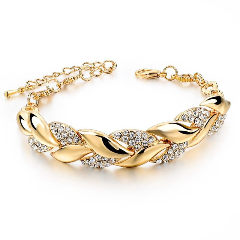 Crafted to perfection with beautiful bohemian styling, these stunning gold-plated bracelets benefit from a mesmerizing round shape and a sumptuous link-chain. The luxurious gold finish is complemented by the glamorous rhinestones for an irresistible sparkle that will turn heads everywhere!