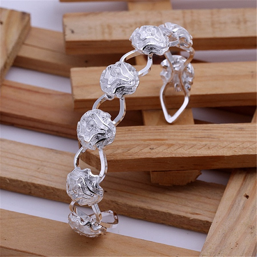 The magnificent Classic Double Round Head Bracelet is silver plated with Fashion flair, making it a must-have for any Unisex look! Don't miss out on these stunning Bangles!