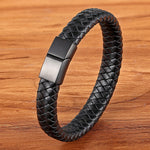 Experience masculine elegance with this Genuine Leather/Stainless Steel Bracelet! Designed with a Classic Shape and Geometric Pattern, this timeless men's bracelet radiates classic style. Let this refined, braided black bracelet elevate your style!