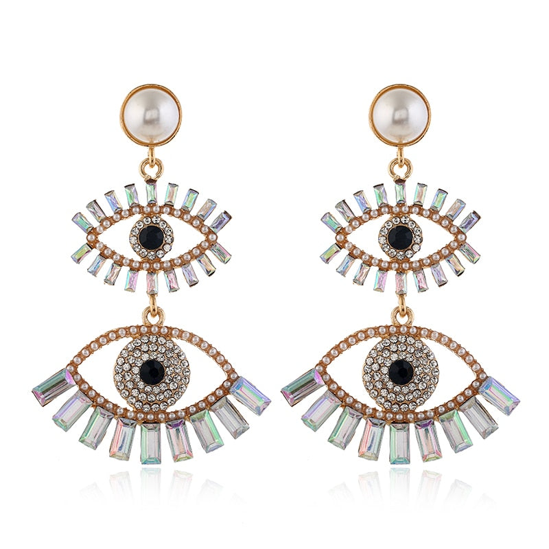 Fashion-forward and flashy, these Geometric Rhinestone Evil Eye Statement Earrings offer beauty and style. Perfect for any look, these stunning earrings are crafted for women, making sure you dazzle wherever you go!