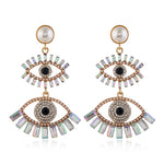 Fashion-forward and flashy, these Geometric Rhinestone Evil Eye Statement Earrings offer beauty and style. Perfect for any look, these stunning earrings are crafted for women, making sure you dazzle wherever you go!