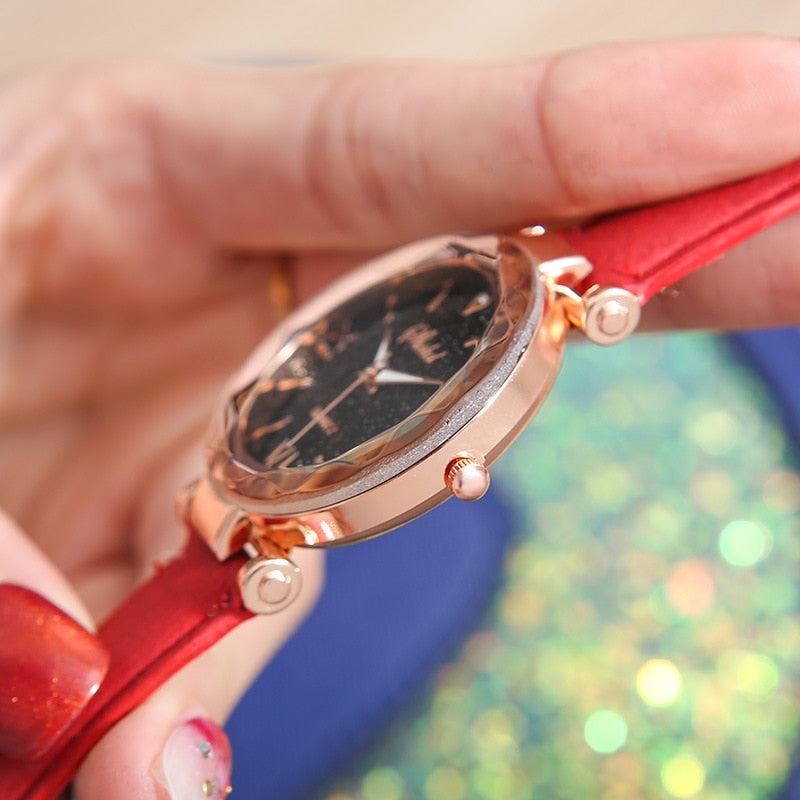 Rhinestone Romantic Starry Sky Women's Luxury Watch - A celestial-themed watch with twinkling rhinestones on the dial, Tungsten Steel case, and a luxurious leather band.