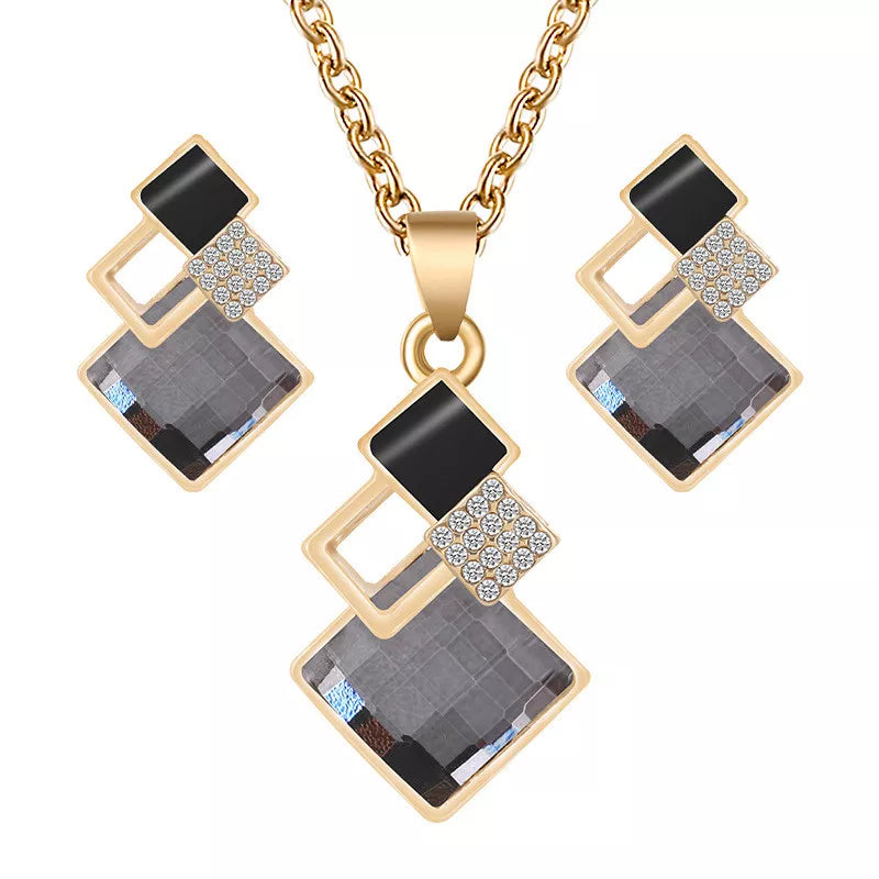 Explore our exquisite collection of crystal pendant necklaces and earrings sets designed for women. This jewelry set is perfect for bridal wear or as a statement piece for a wedding choker necklace set.