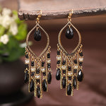 These Bohema Ethnic Fringed Tassel Earrings boast a stylish geometric shape and are crafted with a glossy acrylic water drop. Women of all ages will love wearing these beautiful metal earrings.