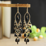 These Bohema Ethnic Fringed Tassel Earrings boast a stylish geometric shape and are crafted with a glossy acrylic water drop. Women of all ages will love wearing these beautiful metal earrings.