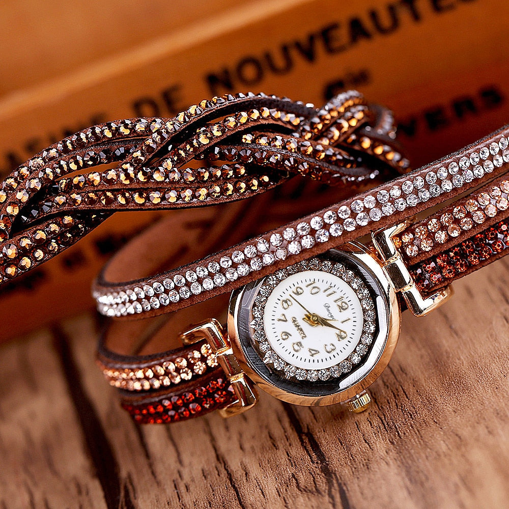 Stay polished and professional with whatever the occasion calls for. This Luxury Crystal Woman Gold Bracelet Quartz Watch features a chic design perfect for any ensemble.