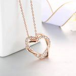 Exquisite Heart shape, ravishing Pendant Necklaces crafted from Copper and bejeweled with Cubic Zirconia - designed to make any look sophisticated. Women's Fashion Necklaces, with a Link Chain finish, perfect for any occasion.