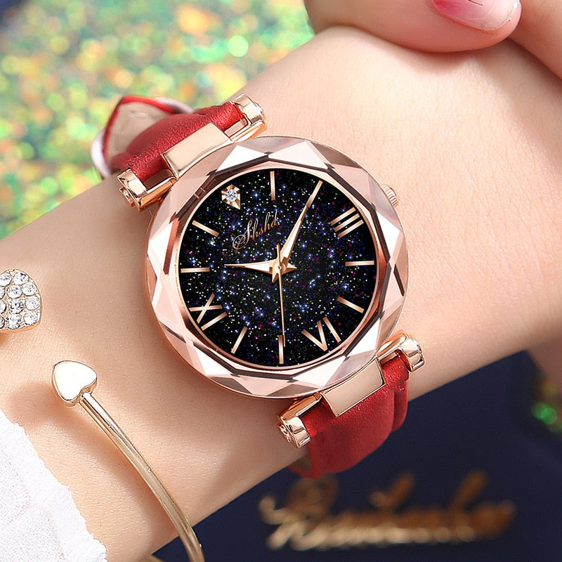 Rhinestone Romantic Starry Sky Women's Luxury Watch - A celestial-themed watch with twinkling rhinestones on the dial, Tungsten Steel case, and a luxurious leather band.