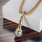 Discover the latest fashion with this pendant necklace featuring a trendy microphone shape. Suitable for both men and women, this bohemian crystal inlaid pendant adds a touch of style to any outfit. Complete your look with this unique accessory that showcases your love for music and fashion.