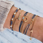 Spectacularly crafted out of copper, this fashion-forward bracelet is unisex and universally compatible. Boasting a lobster-claw fastening and a rope chain, the Vintage Boho Charm Bracelet is an exquisite addition to any wardrobe!