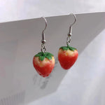 The elegant and minimalist design of the acrylic strawberry pendant earrings adds a touch of simplicity to any outfit. Crafted with high-quality materials, these drop earrings are a thoughtful gift for girls and women who appreciate lovely jewelry.