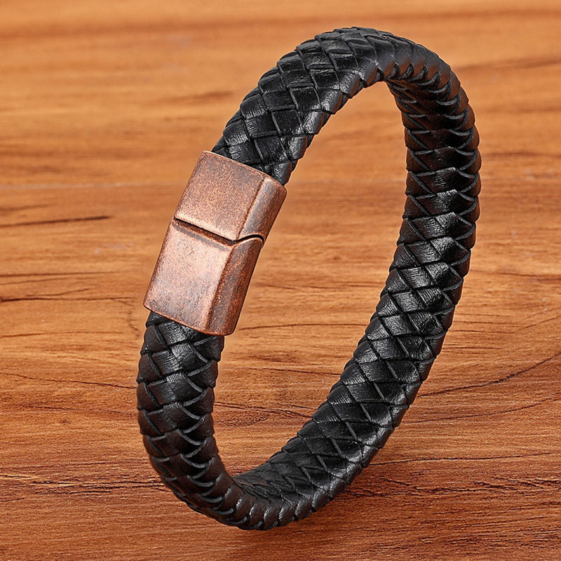 Experience masculine elegance with this Genuine Leather/Stainless Steel Bracelet! Designed with a Classic Shape and Geometric Pattern, this timeless men's bracelet radiates classic style. Let this refined, braided black bracelet elevate your style!