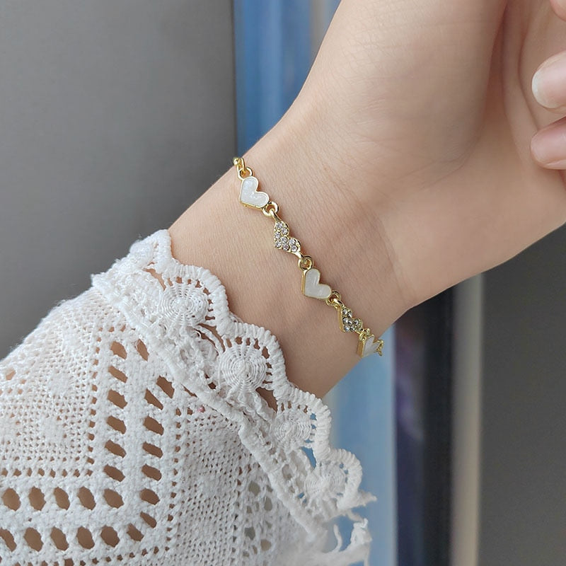 This beautiful metal bracelet is the perfect accessory to any look. Show off your unique style with this one-of-a-kind piece of jewelry that is sure to turn heads.