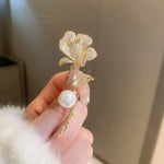 Enhance your wardrobe with these exquisite Fashion Pearl Leaf Rhinestone Brooches, designed exclusively for women. These elegant metal fixed clothing pins are not only stylish but also serve as daily jewelry accessories, adding a touch of sophistication to any outfit.