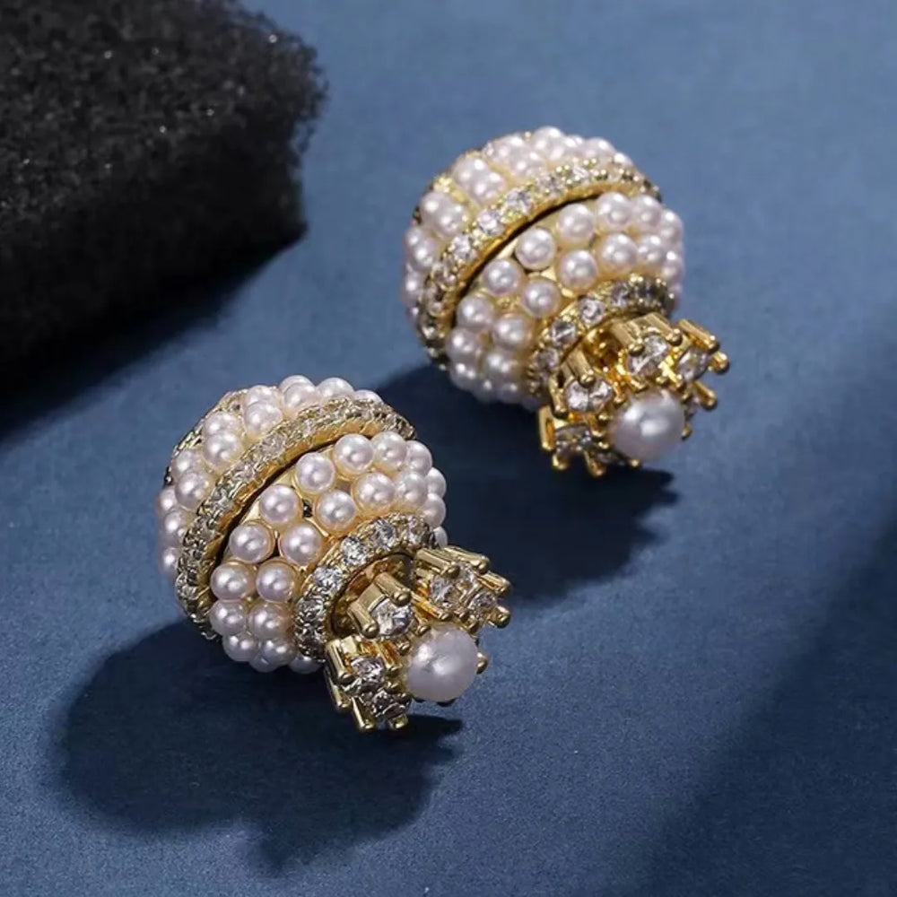 A stunning collection of elegant and luxurious women's jewelry with our fashion pearl earrings. These sweet and classic pearl earrings are adorned with sparkling zircon stones, making them the perfect accessory for any party or banquet. Explore our wholesale options and find the ideal gift for someone special.