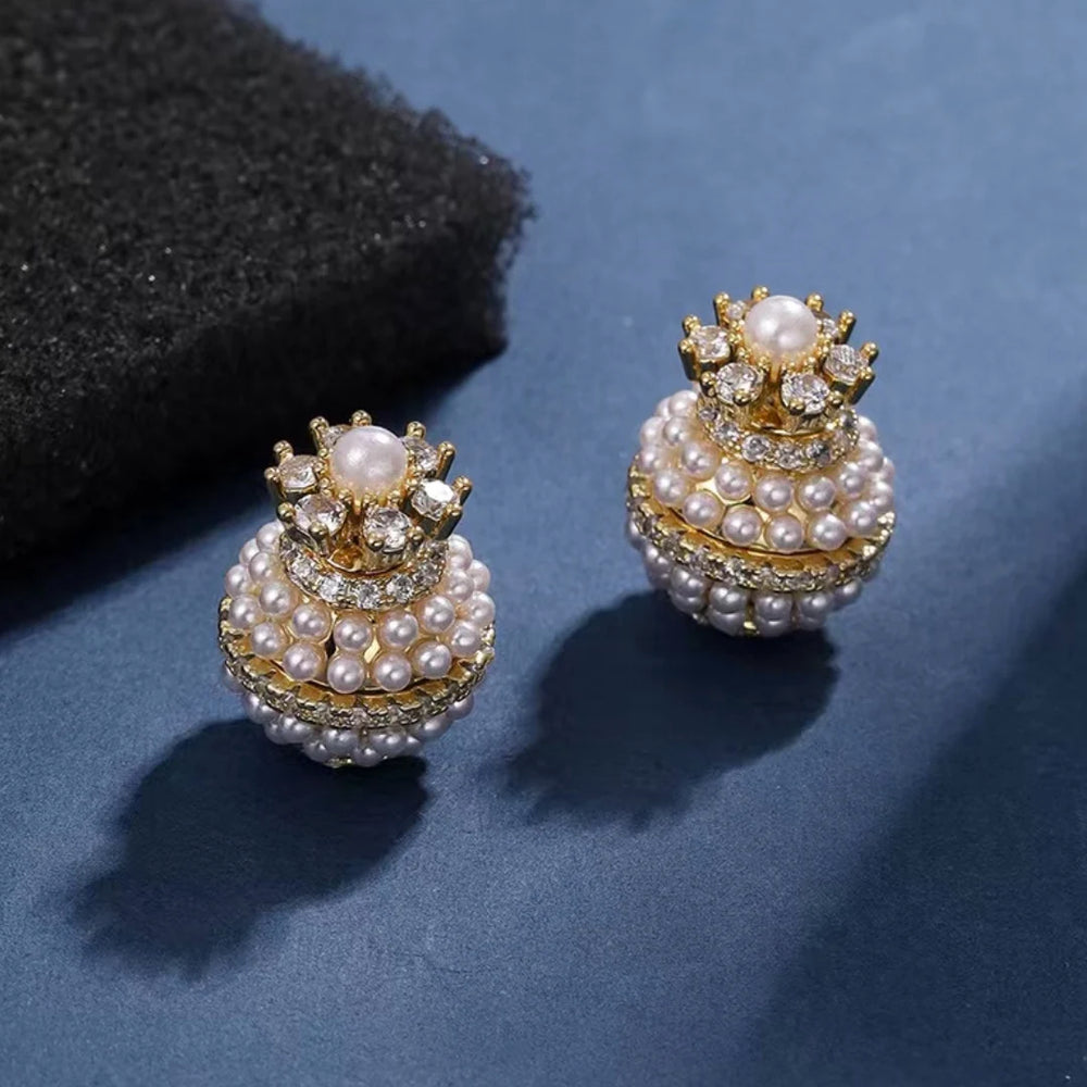 A stunning collection of elegant and luxurious women's jewelry with our fashion pearl earrings. These sweet and classic pearl earrings are adorned with sparkling zircon stones, making them the perfect accessory for any party or banquet. Explore our wholesale options and find the ideal gift for someone special.