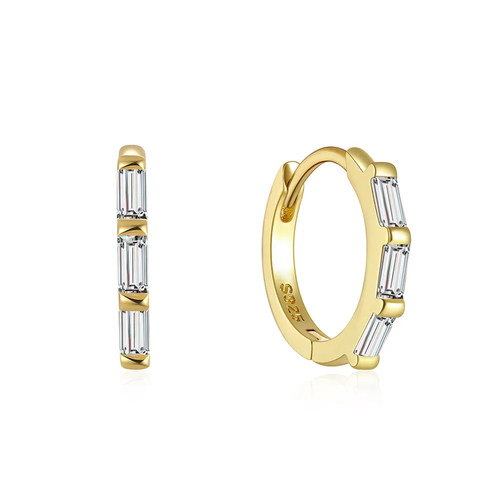 These small huggie earrings are made of 925 sterling silver with a glossy gold color finish, perfect for cartilage piercings. The fine jewelry accessories are designed to add a touch of elegance to any outfit.