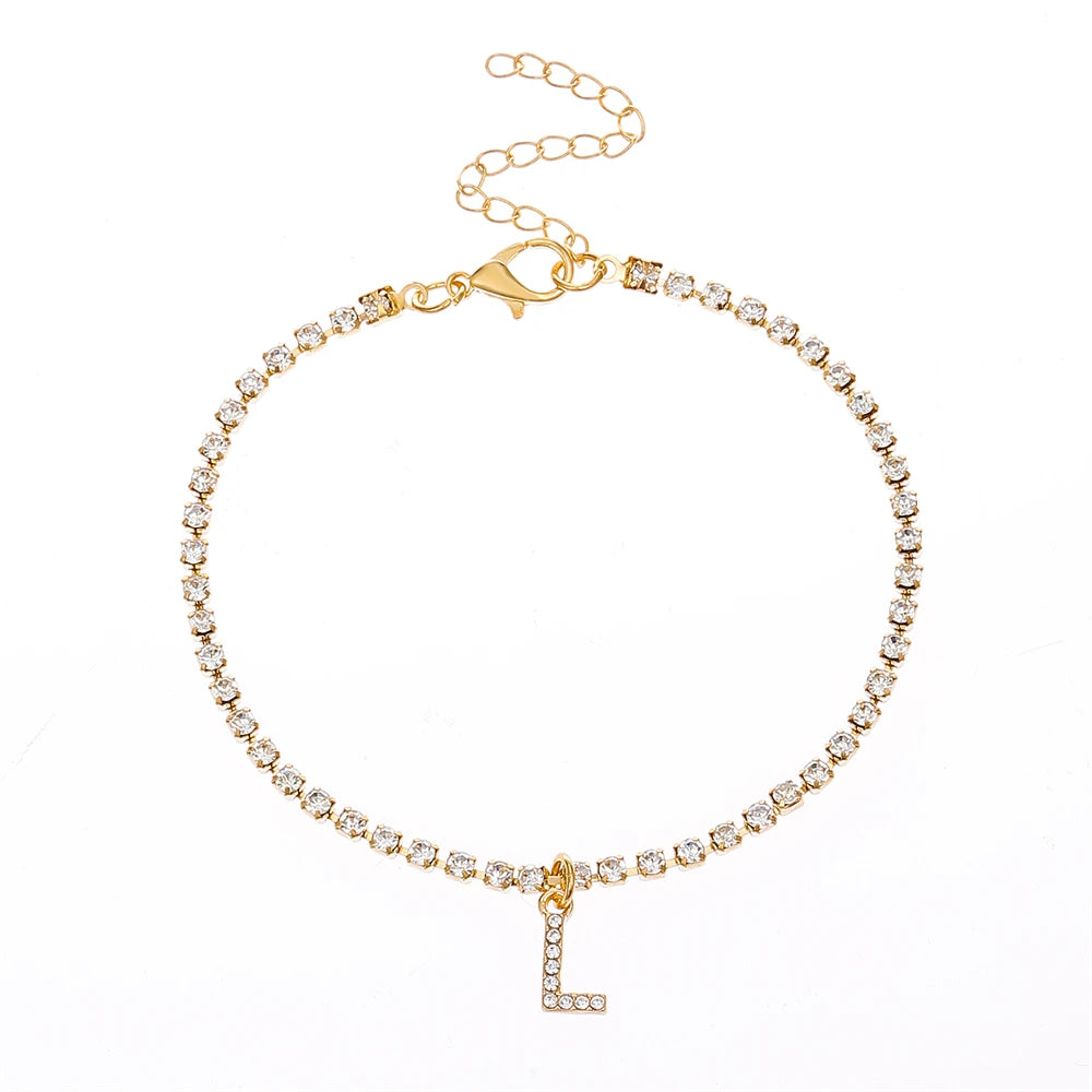 This ankle bracelet features an initial letter design with crystal zircon accents, perfect for women looking for a stylish foot chain to wear at the beach or as boho jewelry.