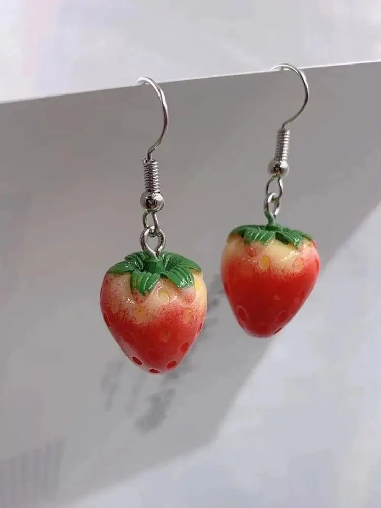 The elegant and minimalist design of the acrylic strawberry pendant earrings adds a touch of simplicity to any outfit. Crafted with high-quality materials, these drop earrings are a thoughtful gift for girls and women who appreciate lovely jewelry.