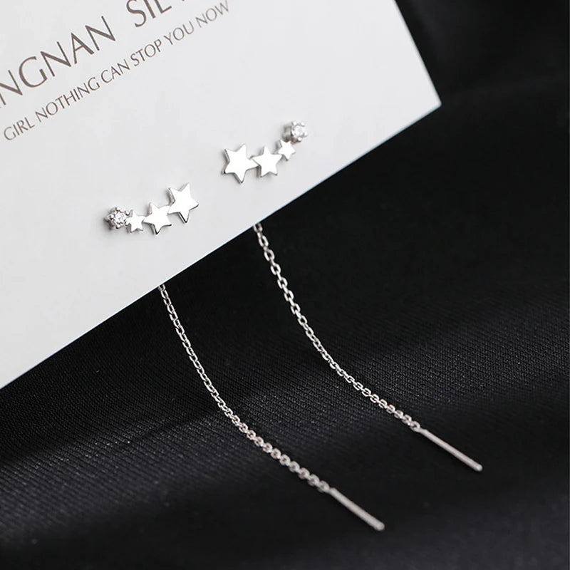 The latest fashion with these elegant Long Wire Tassel Thread Chain Earrings featuring Star and Heart Beads Pendants. Elevate your style with these women's Straight Hanging Earrings that are sure to make a statement in any outfit.