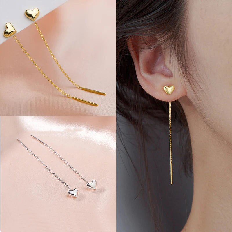 The latest fashion with these elegant Long Wire Tassel Thread Chain Earrings featuring Star and Heart Beads Pendants. Elevate your style with these women's Straight Hanging Earrings that are sure to make a statement in any outfit.