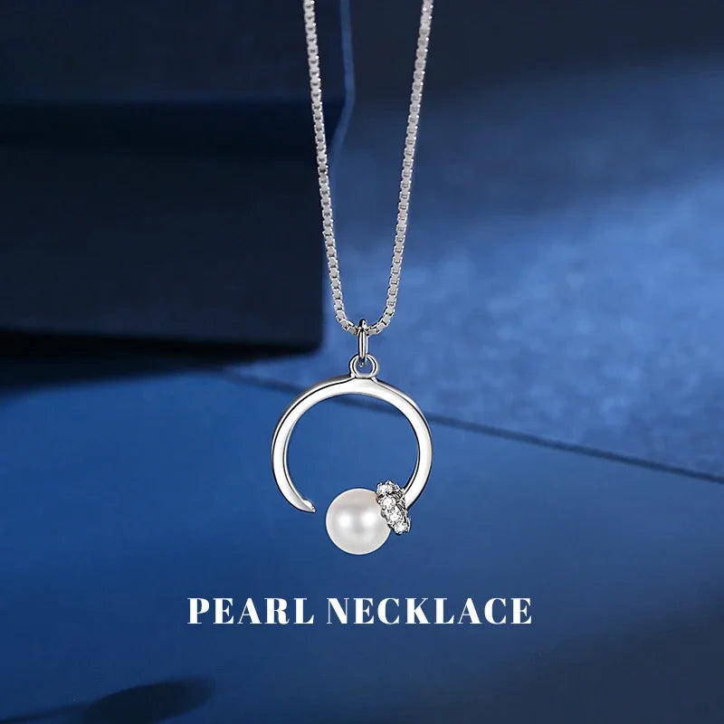 This elegant and luxurious necklace is made of S925 sterling silver and features a beautiful pearl pendant. The minimalist design of the claw bone chain adds a touch of sophistication to this commemorative jewelry gift, perfect for any occasion.