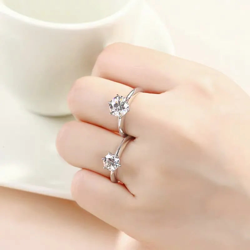 This exquisite 1-5CT VVS1 Lab Diamond Solitaire Ring is a stunning piece of jewelry designed for women. It is perfect for engagements, promises, and weddings, adding a touch of elegance and beauty to any occasion.